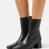 Filippa K EILEEN BOOT - Classic Ankle Boots - Black -Filippa K shop 5d4fb661ffc84e0d90c45c9bf343c63f